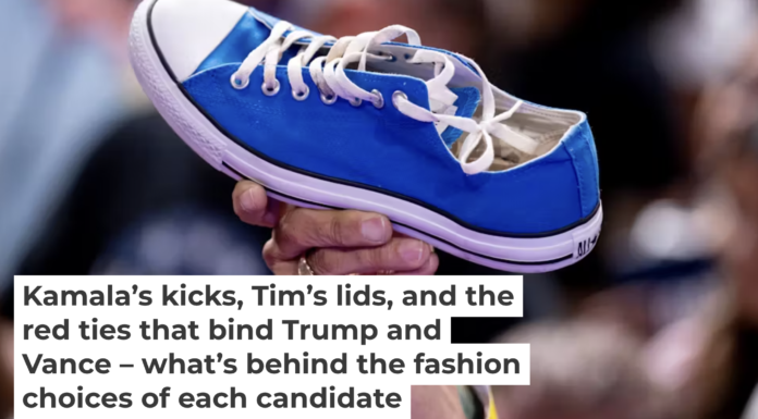 A man holds up a Converse Chuck Taylor – Kamala Harris’ favorite footwear – during the vice president’s campaign rally on Aug. 9, 2024, in Glendale, Ariz. Andrew Harnik/Getty Images